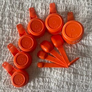 Vintage Tupperware orange measuring cups and spoons full set